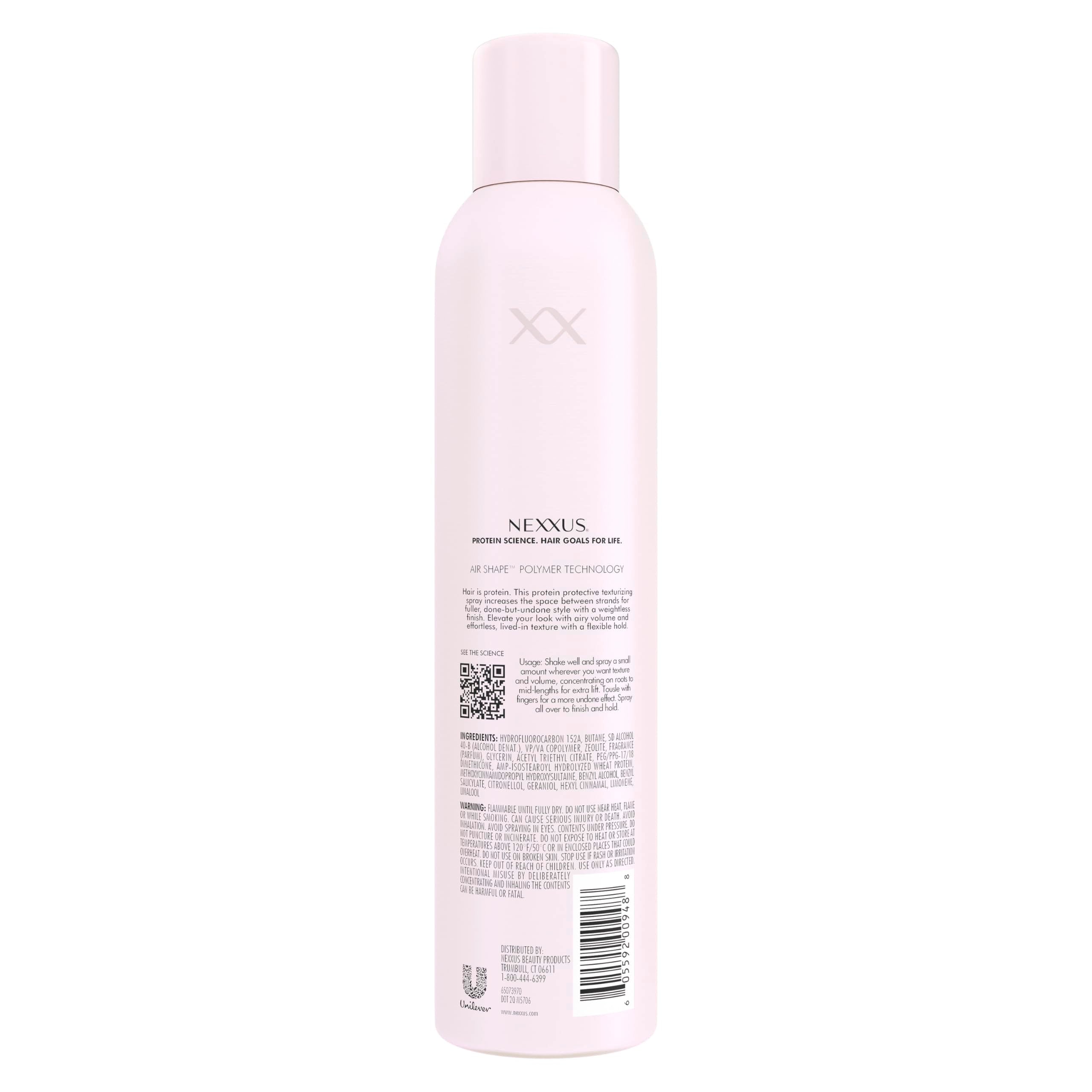 Nexxus spray nozzle detail illustrating controlled mist for even application
