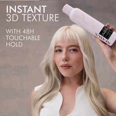 Nexxus spray in use on model creating instant 3D texture and lift