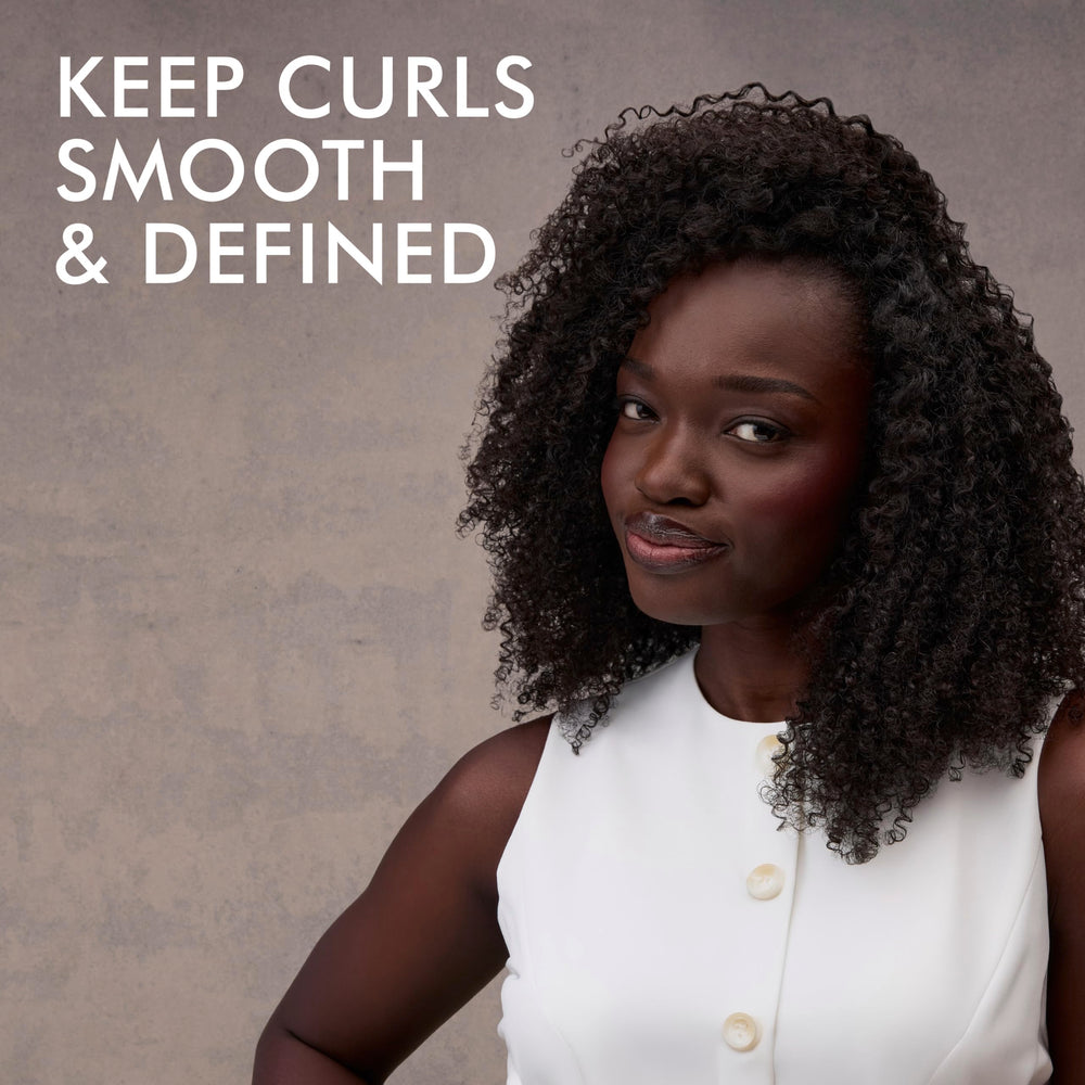Nexxus before and after showing improved curl definition