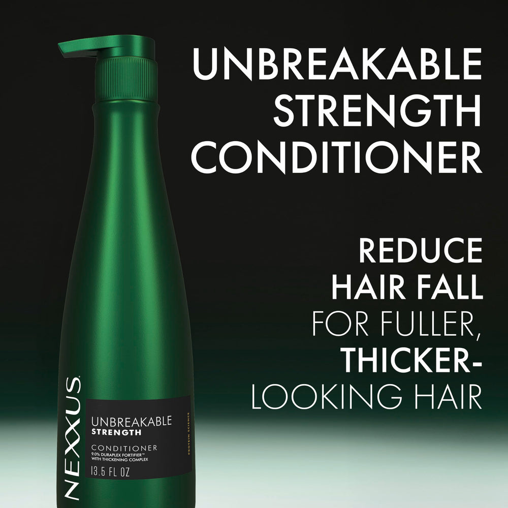 Nexxus conditioner being smoothed through hair to reduce breakage