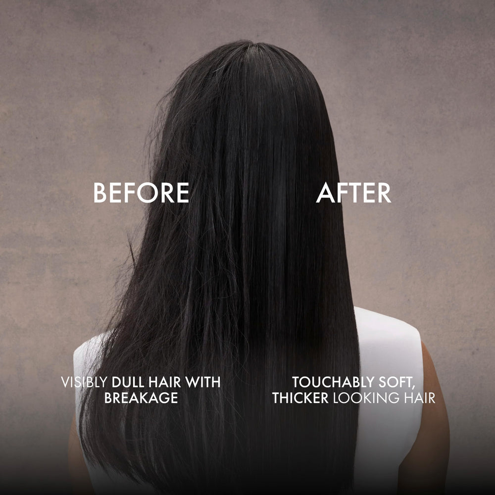 Nexxus conditioner held in hand illustrating 13.5 oz size