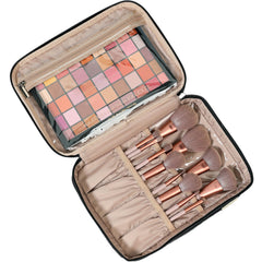 NISHEL top compartment open with brushes in slip pockets for organized storage