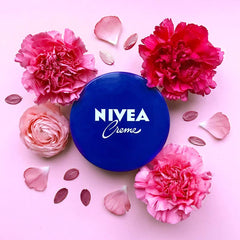 NIVEA Creme beside a hand for scale showing generous 200ml size benefit