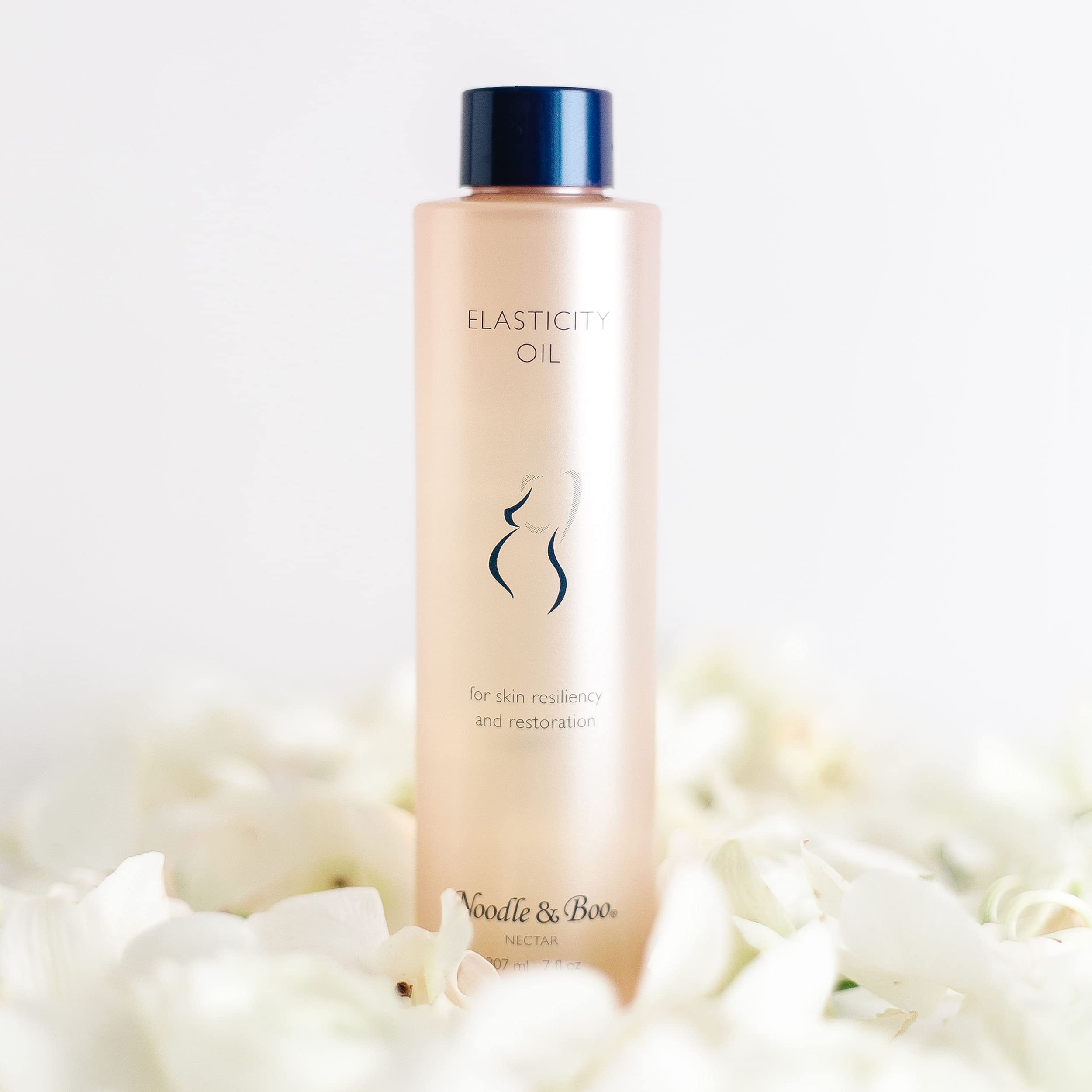 Noodle & Boo oil texture closeup highlighting smooth absorbent oil benefits