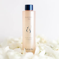 Noodle & Boo oil texture closeup highlighting smooth absorbent oil benefits
