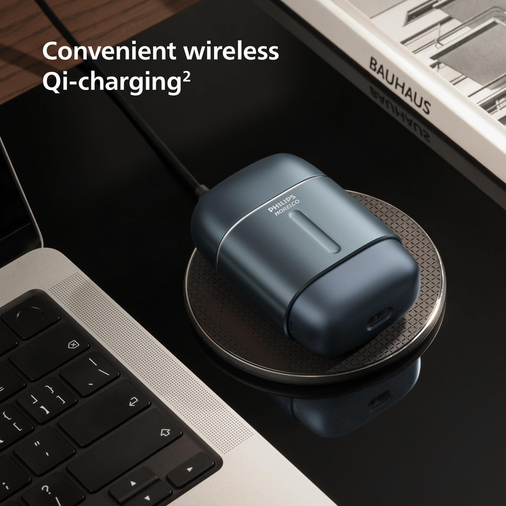 Norelco 700 Series with travel pouch and USB-A cable showing packing and charging readiness