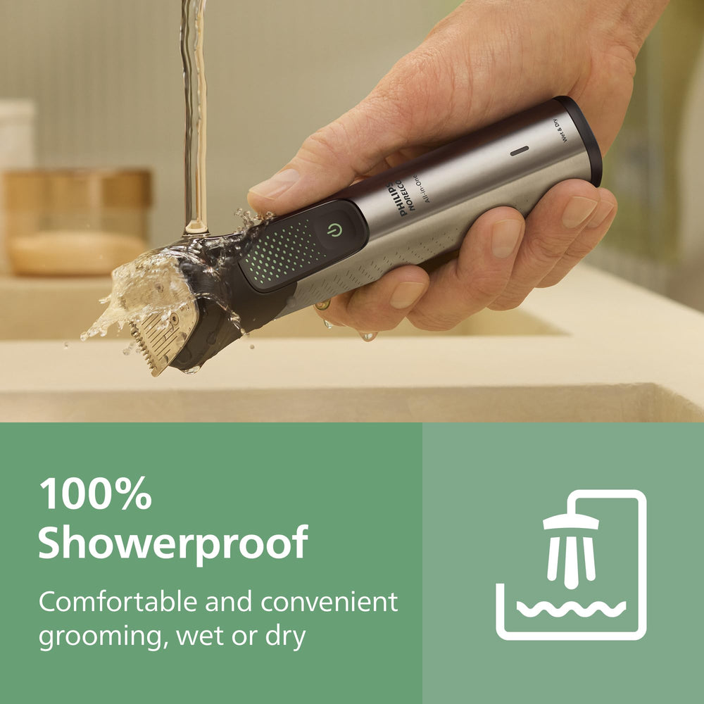 Norelco All-in-One 9000 held in hand to show size and ergonomic control for comfortable grooming