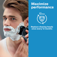 Norelco replacement head attached to shaver in hand for quick installation benefit