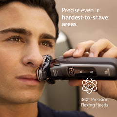 Norelco i9000 held shaving along neck contour demonstrating consistent contact for fewer passes