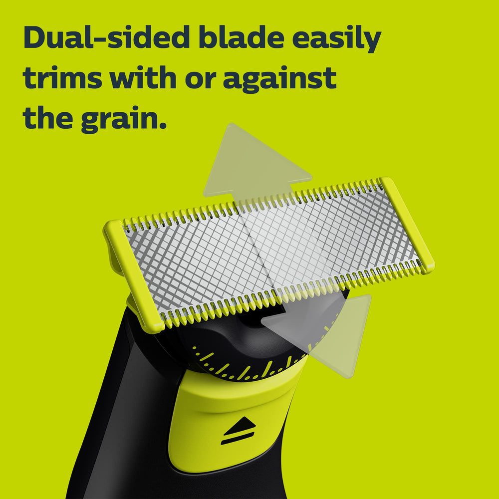 Norelco OneBlade blade being rinsed under water for easy cleaning