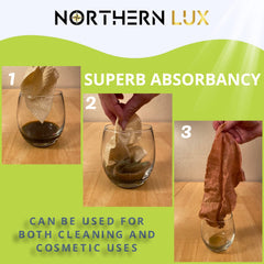 Northern Lux towel next to hand for scale showing compact, travel-friendly size