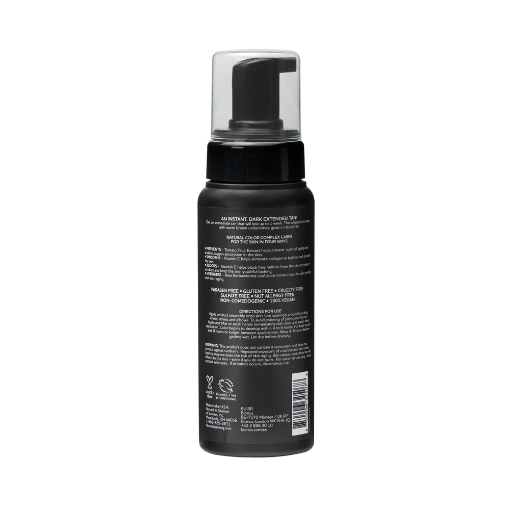 Norvell product in beach scene illustrating healthy sunless glow