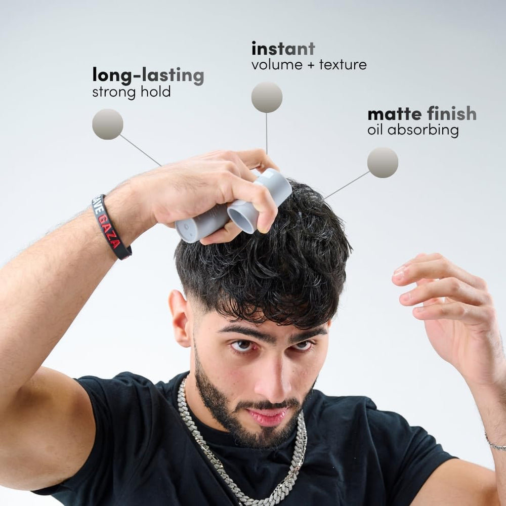NOUN close-up hair texture showing matte, natural-looking hold
