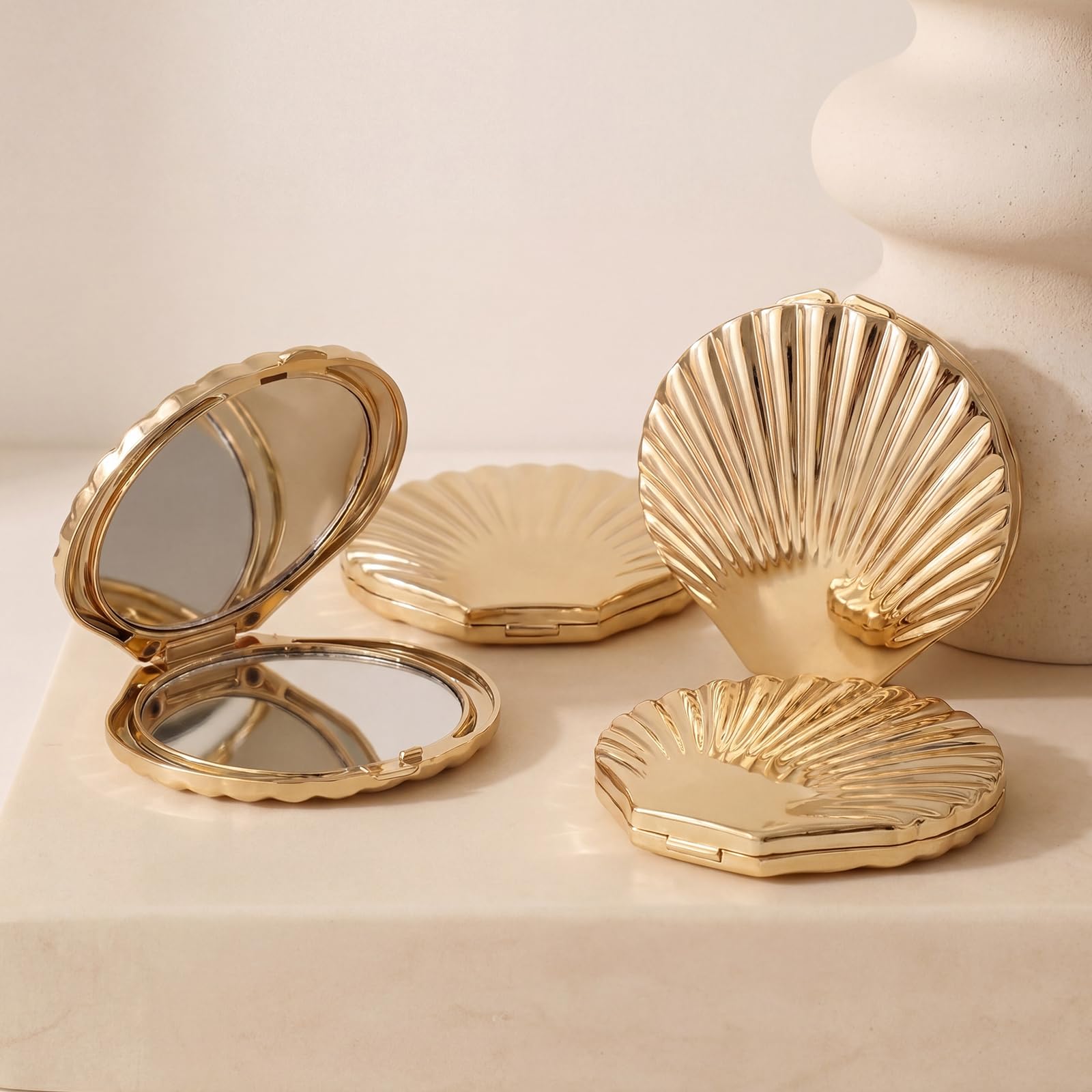 Novabright front view of golden seashell compact mirror showing elegant finish and portability benefits