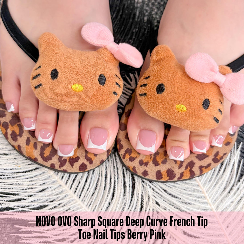 NOVO OVO nail tips held in hand demonstrating medium sharp square length and scale