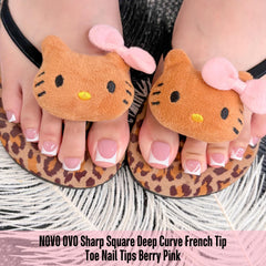 NOVO OVO nail tips held in hand demonstrating medium sharp square length and scale