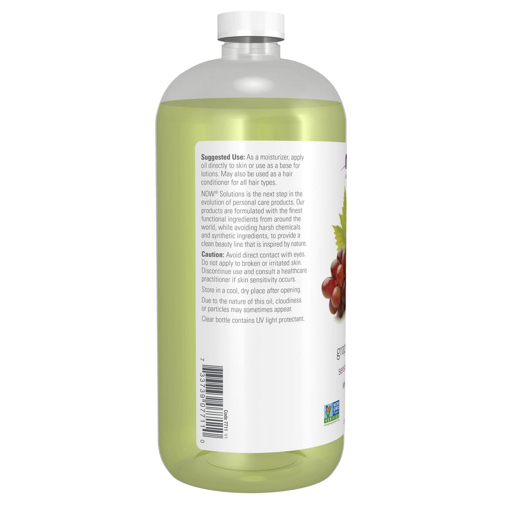 NOW grapeseed oil drop on hand showing silky texture and quick absorption benefit