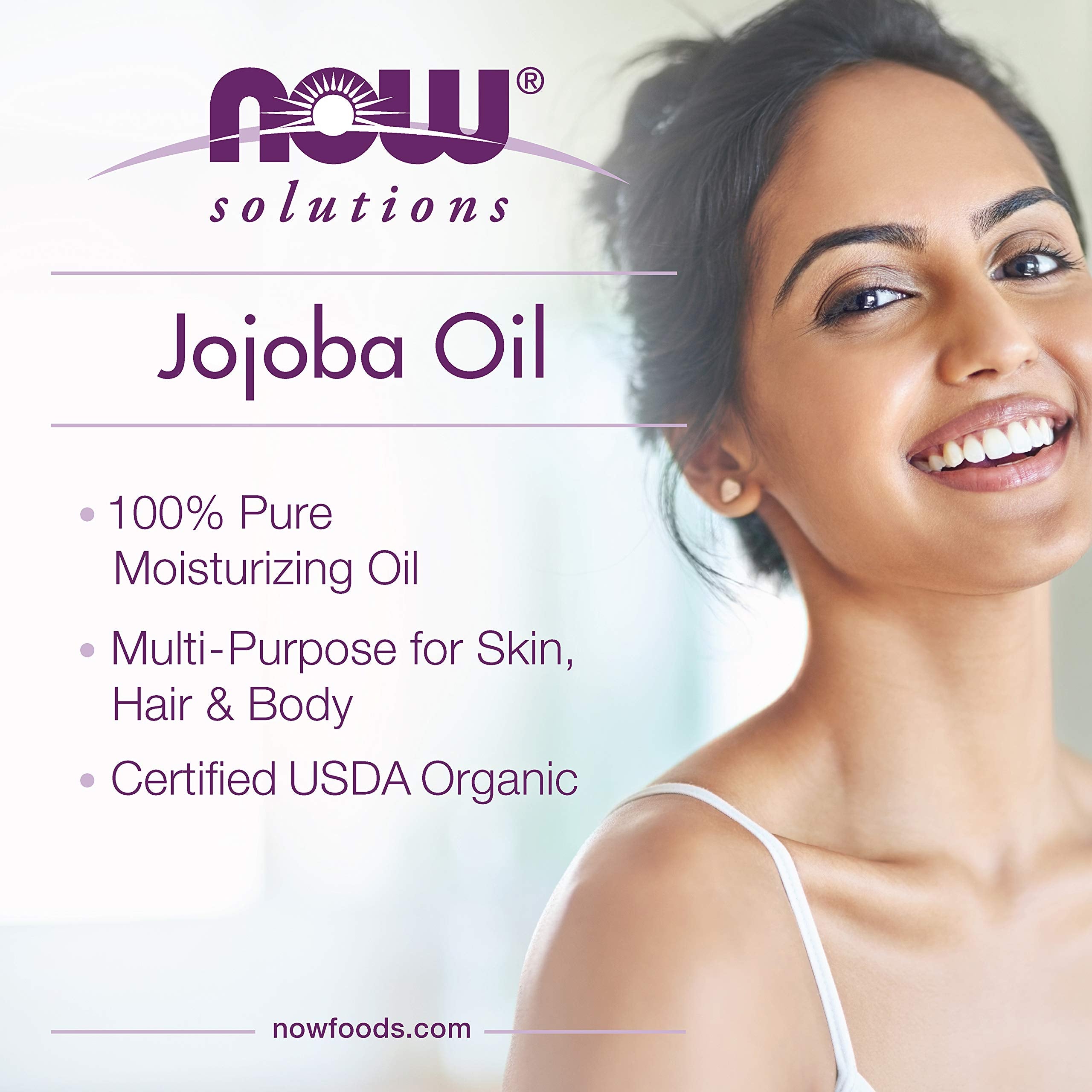 NOW jojoba oil applied to hair ends illustrating frizz control and shine