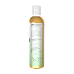 NOW jojoba oil pouring drop into hand demonstrating easy absorption and control