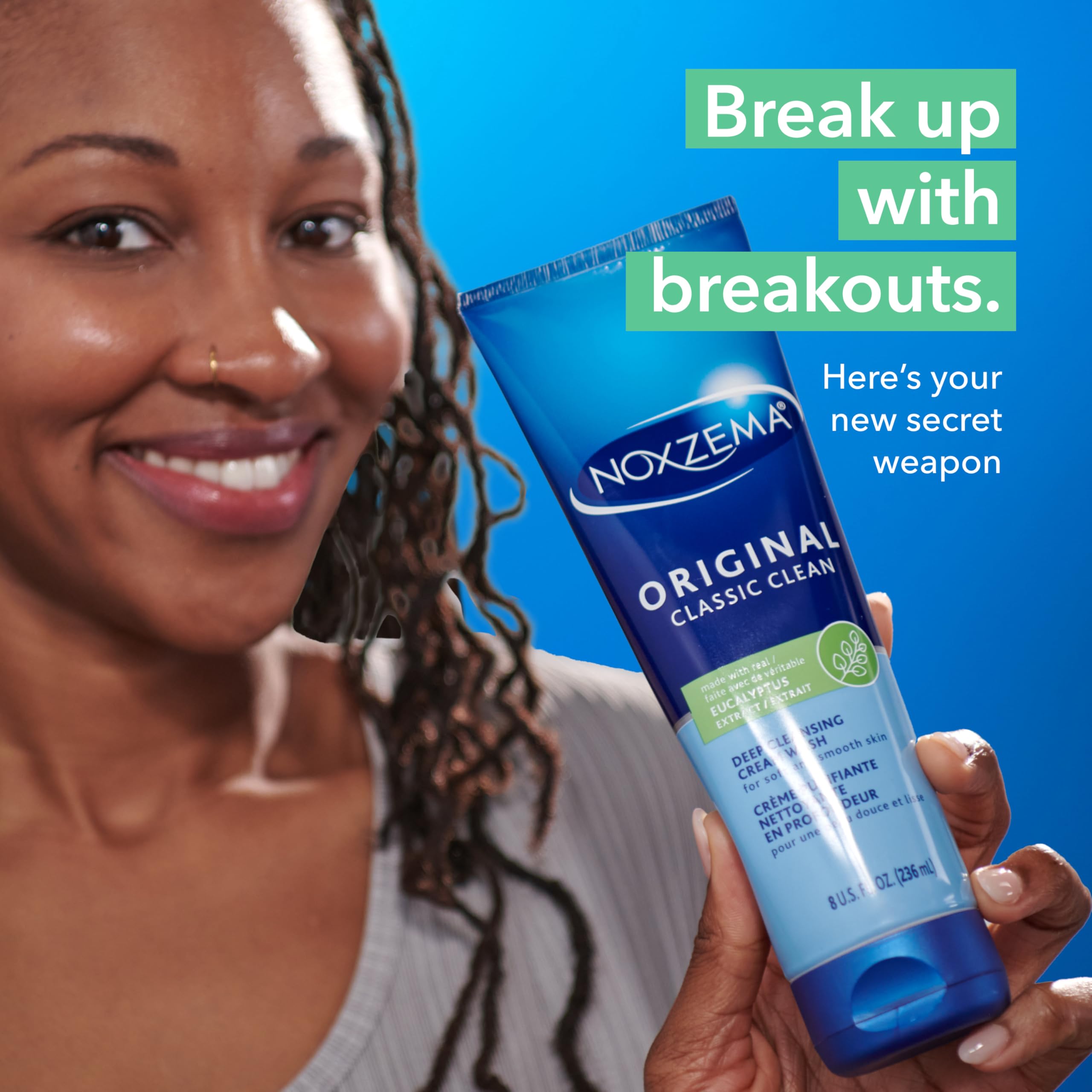 Noxzema cream on fingertips ready to apply for deep cleansing