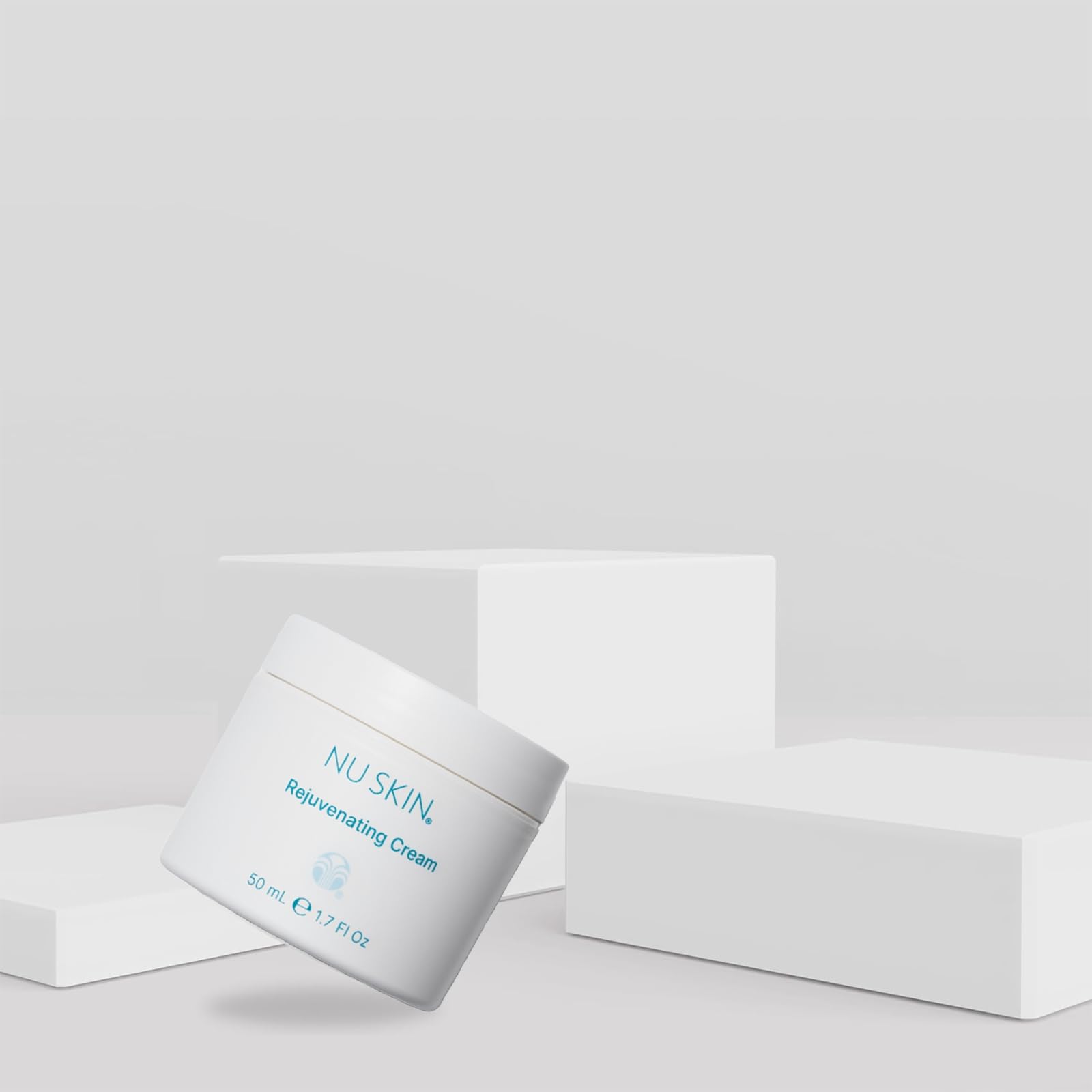 Nu Skin applying cream to hand illustrating quick absorption and comfort