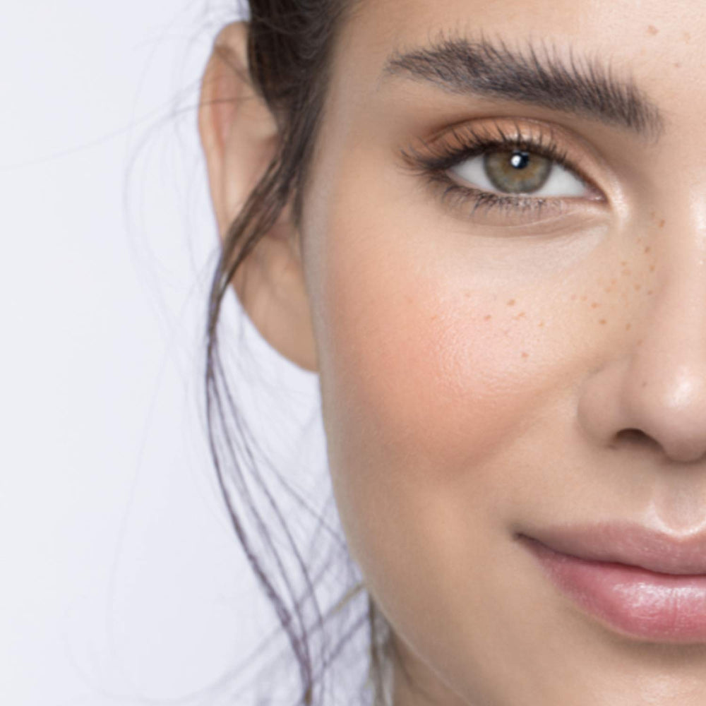 NutraLuxe Lash MD serum texture drop highlighting lightweight absorption