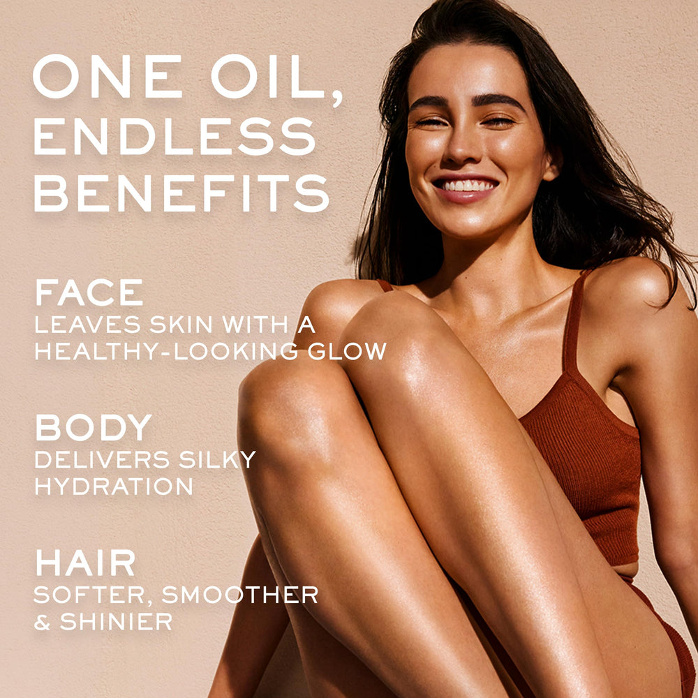 Applying NUXE to hair ends to show smoothing and shine benefit