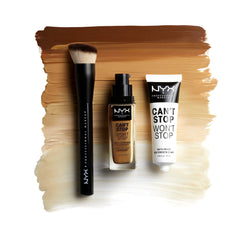 NYX brush applying foundation on model for streak-free, matte finish