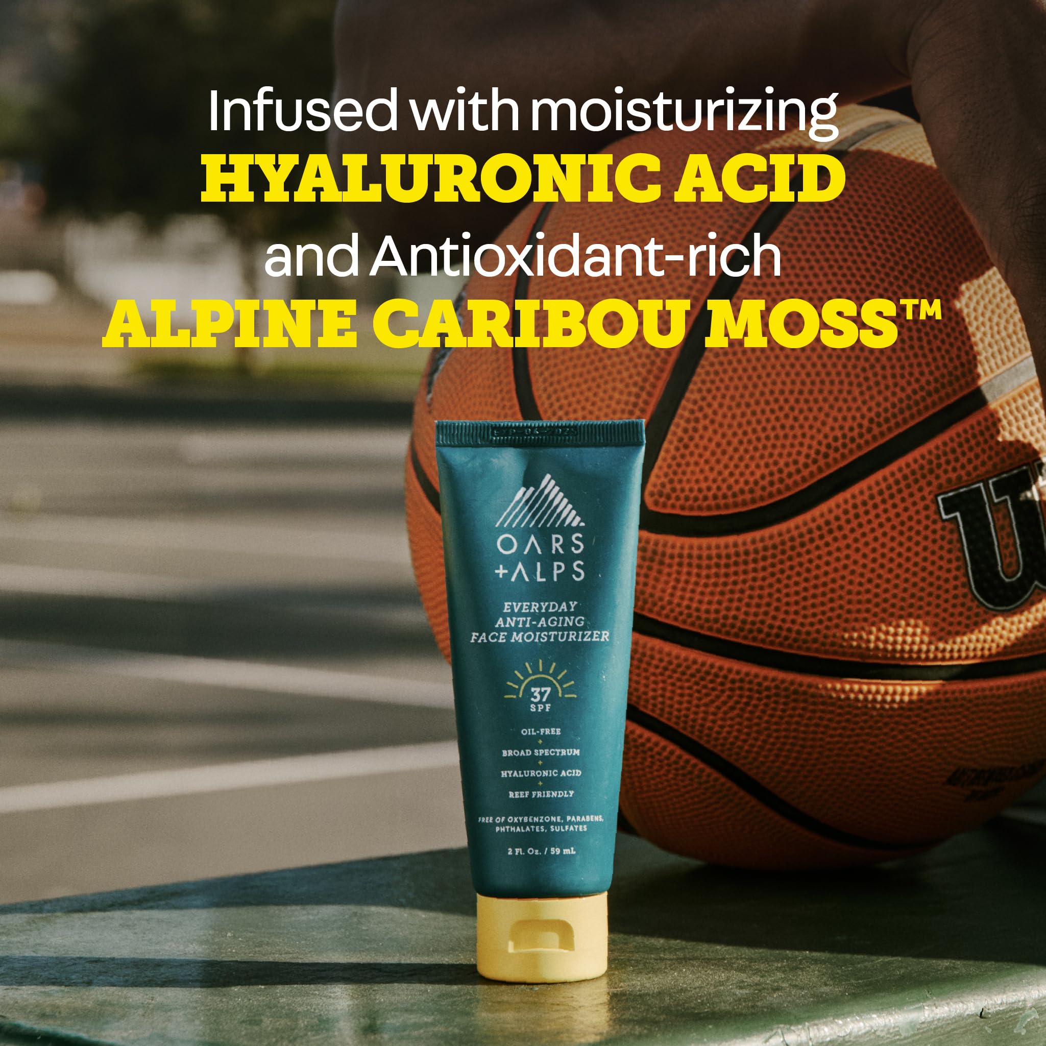 Oars + Alps moisturizer being applied to cheek illustrating smooth coverage and hydration