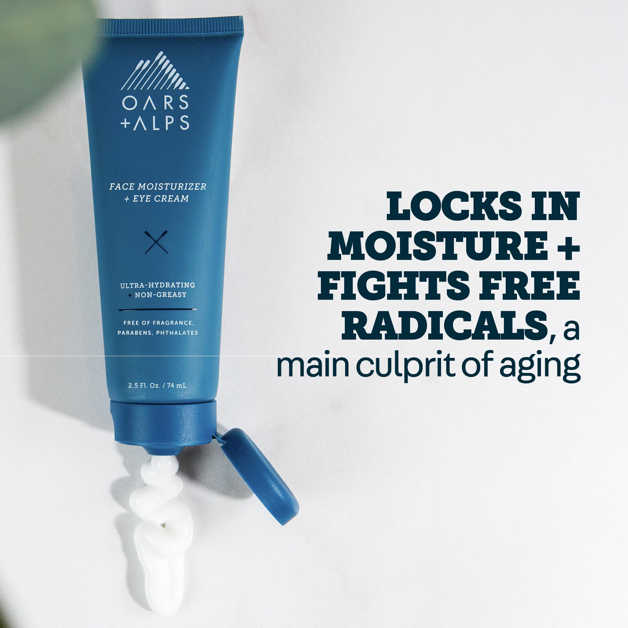 Oars + Alps tube in palm showing travel-friendly TSA approved size