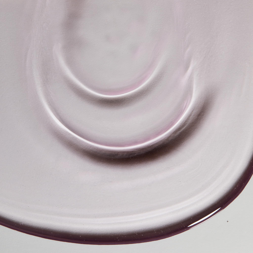 Obagi Medical CLENZIderm M.D. bottle cap and neck detail highlighting secure closure and controlled dispense benefit