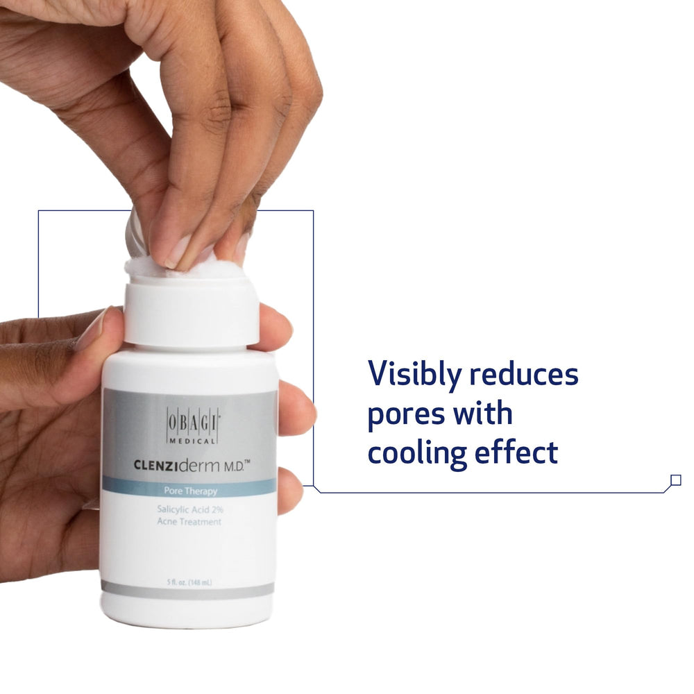 Obagi Medical CLENZIderm M.D. hand holding bottle to display size and user-friendly design benefit