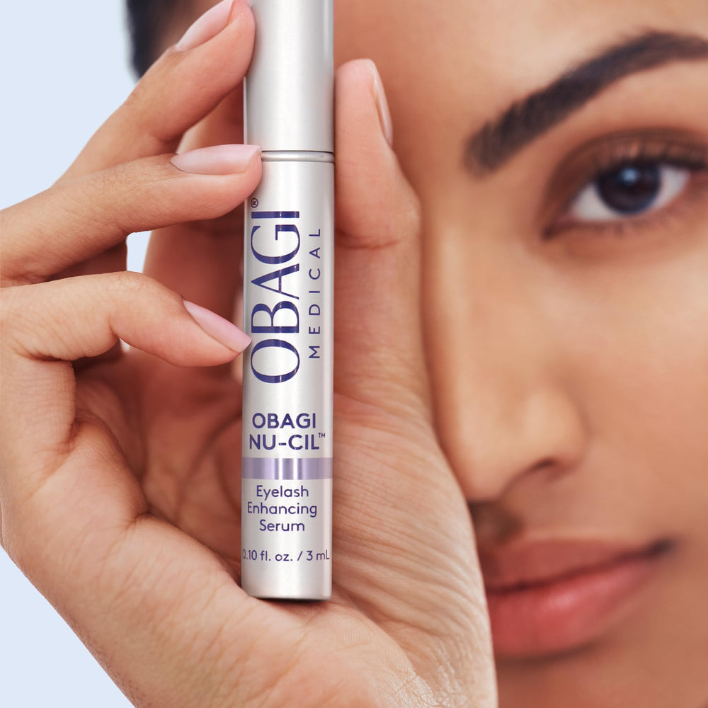 Obagi Nu-Cil opened packaging showing applicators and product presentation
