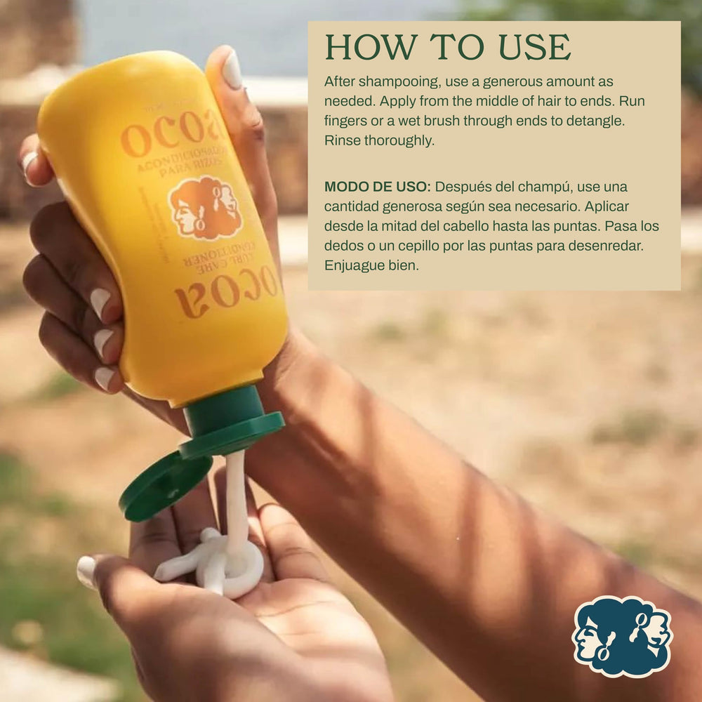 OCOA applying conditioner to wet hair for smoother strands