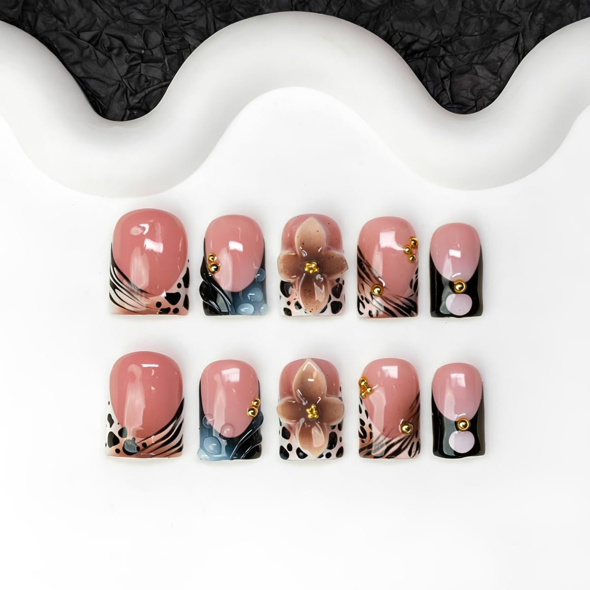 OCOUYVD front set display showing finished short square press-on nails and instant style