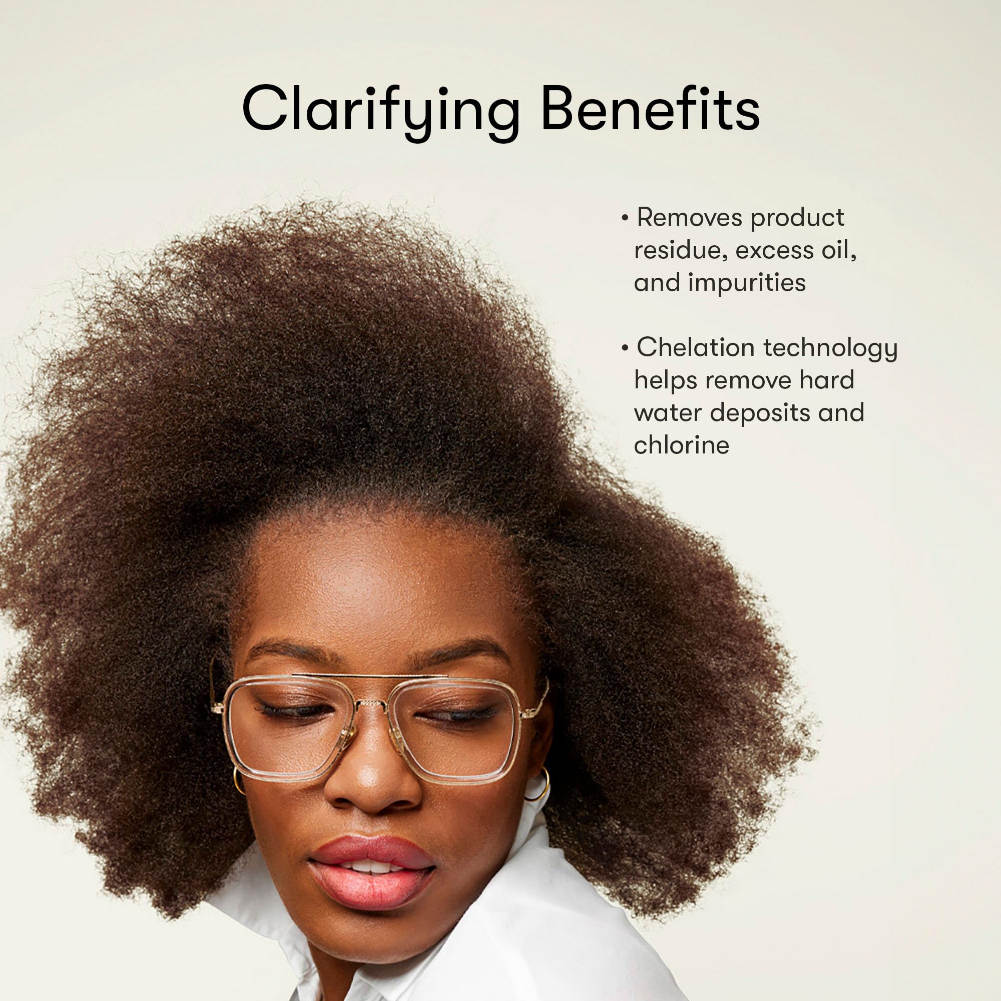 Odele clarifying shampoo pouring into hand demonstrating controlled application