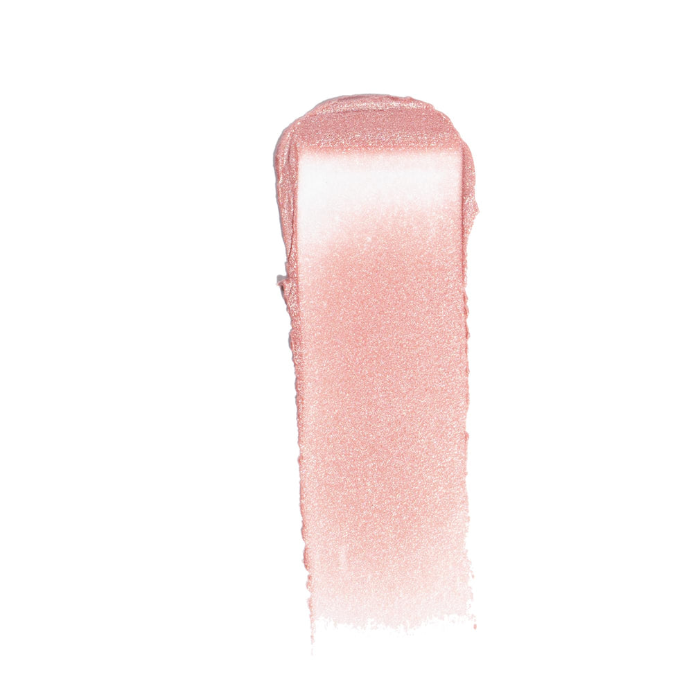 Ogee face stick PEARL inside a small clutch showing on-the-go touch-up convenience benefit