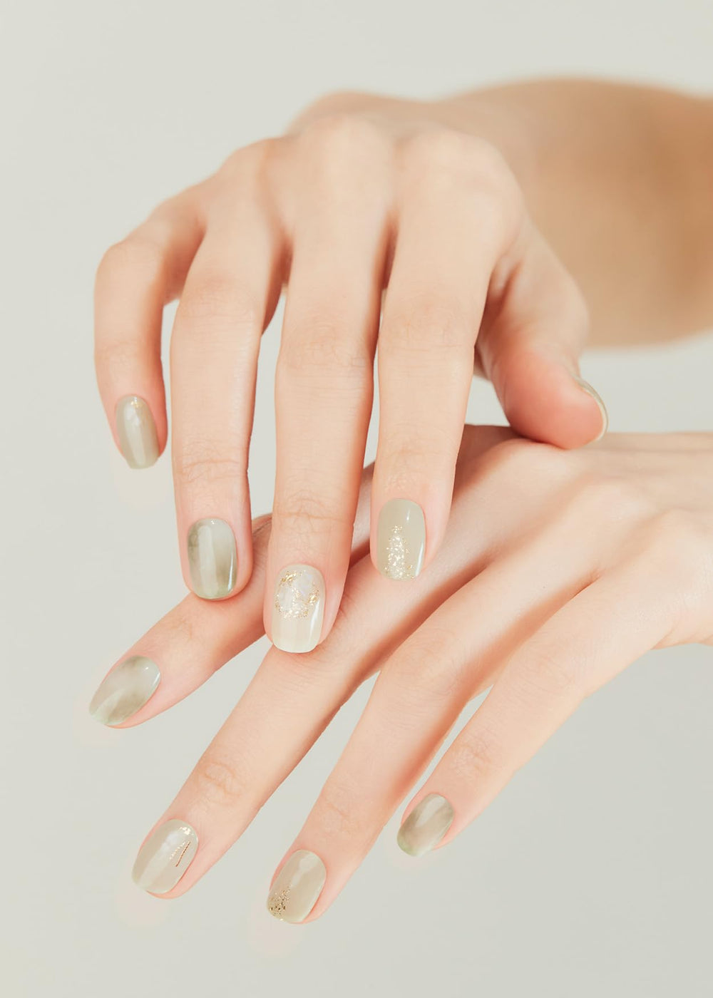 ohora applied on hands showcasing salon-quality green tea nails and neat edges
