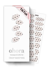 ohora front packaging showing N Polka Noir design and included tools for easy application