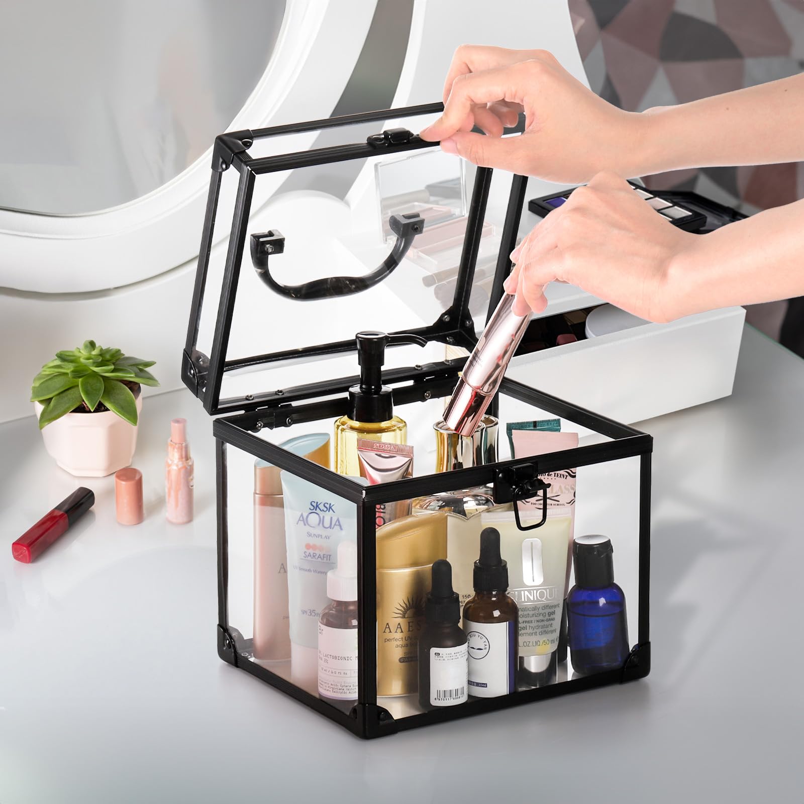 Okllen crown box size comparison with hand showing compact portability