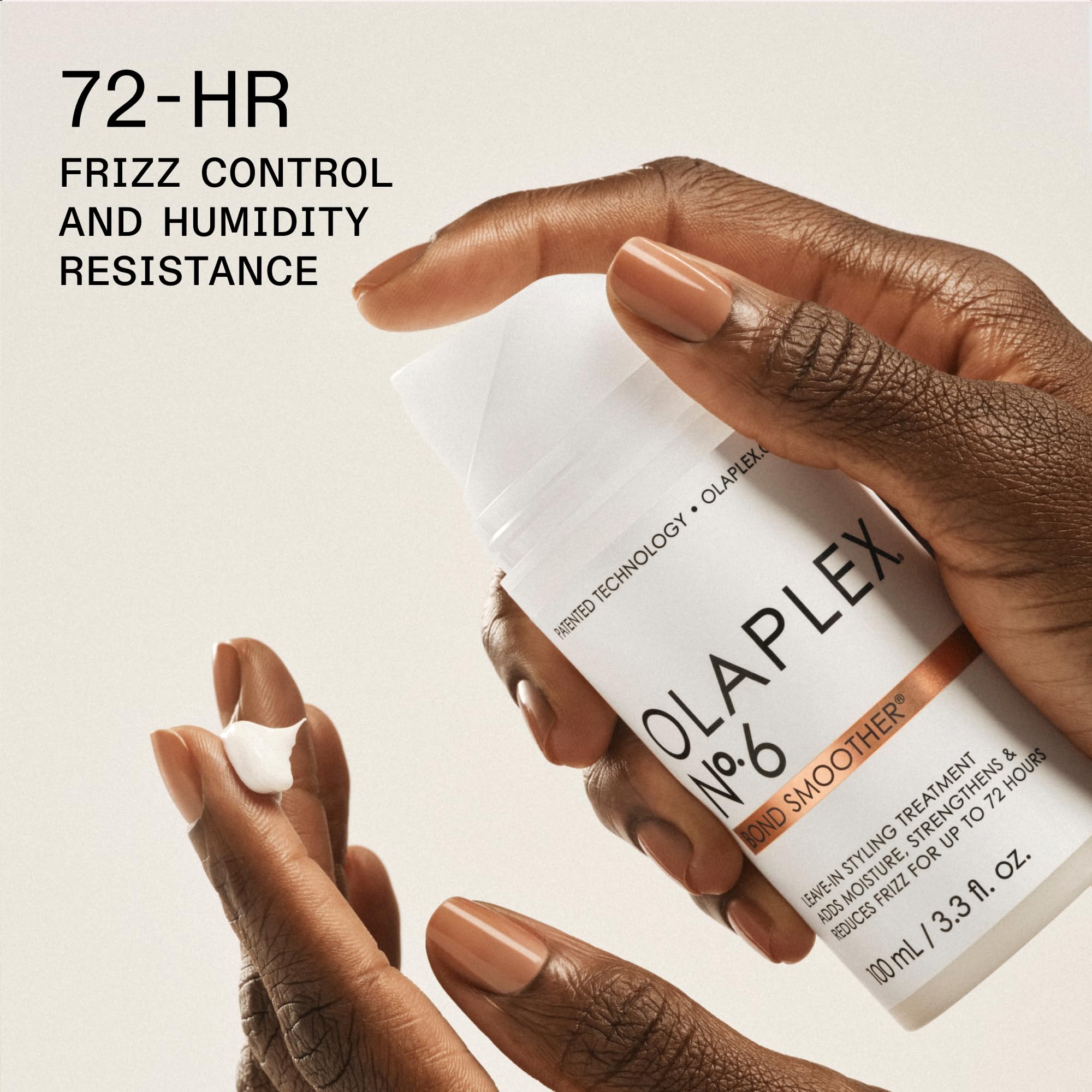 Olaplex N°6 leave-in styler on hands for smoothing and frizz control