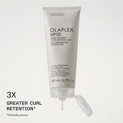 Olaplex No.10 being dispensed from pump to show easy, controlled application and less waste