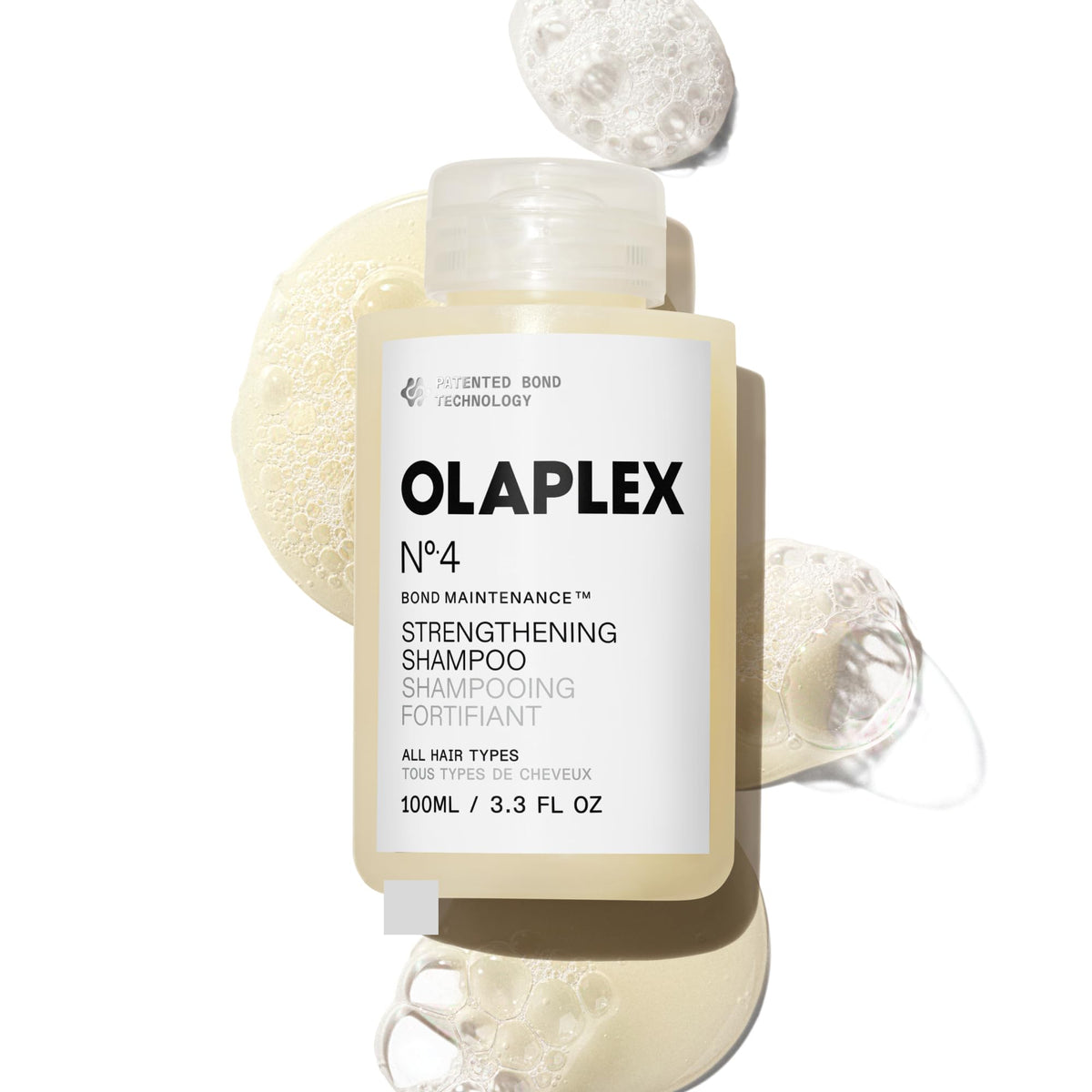 Olaplex No.4 front bottle showing label and benefit of strengthened hair