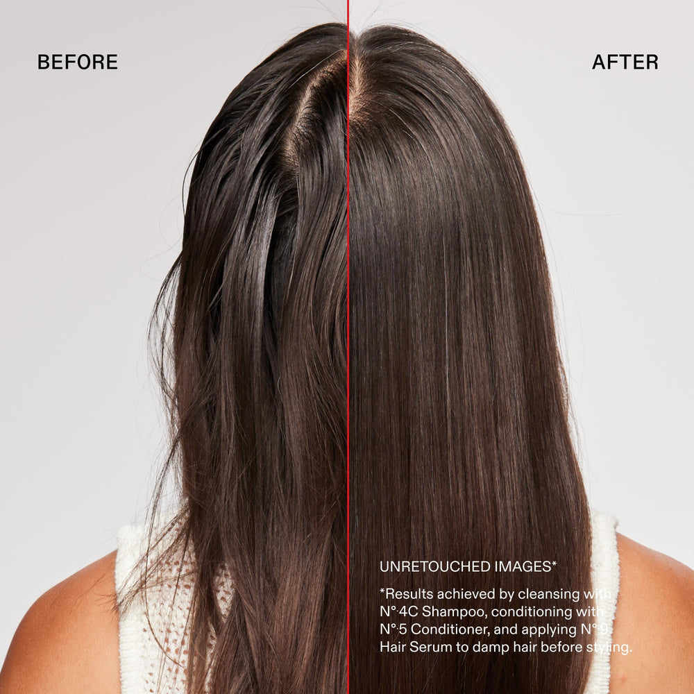 Olaplex N°.4C being applied in shower to remove buildup and refresh hair