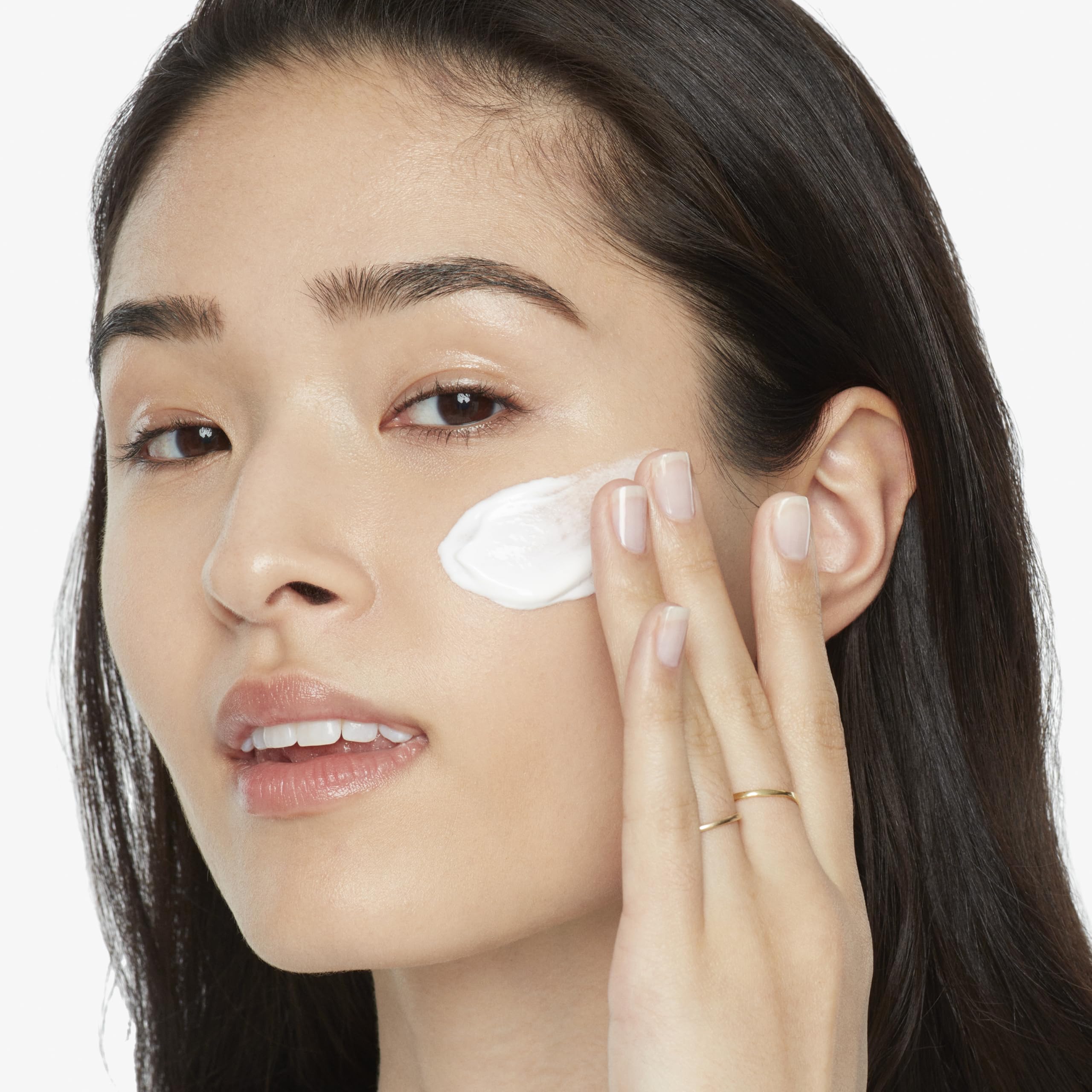 Olay absorbed into skin close-up showing non-greasy finish benefit