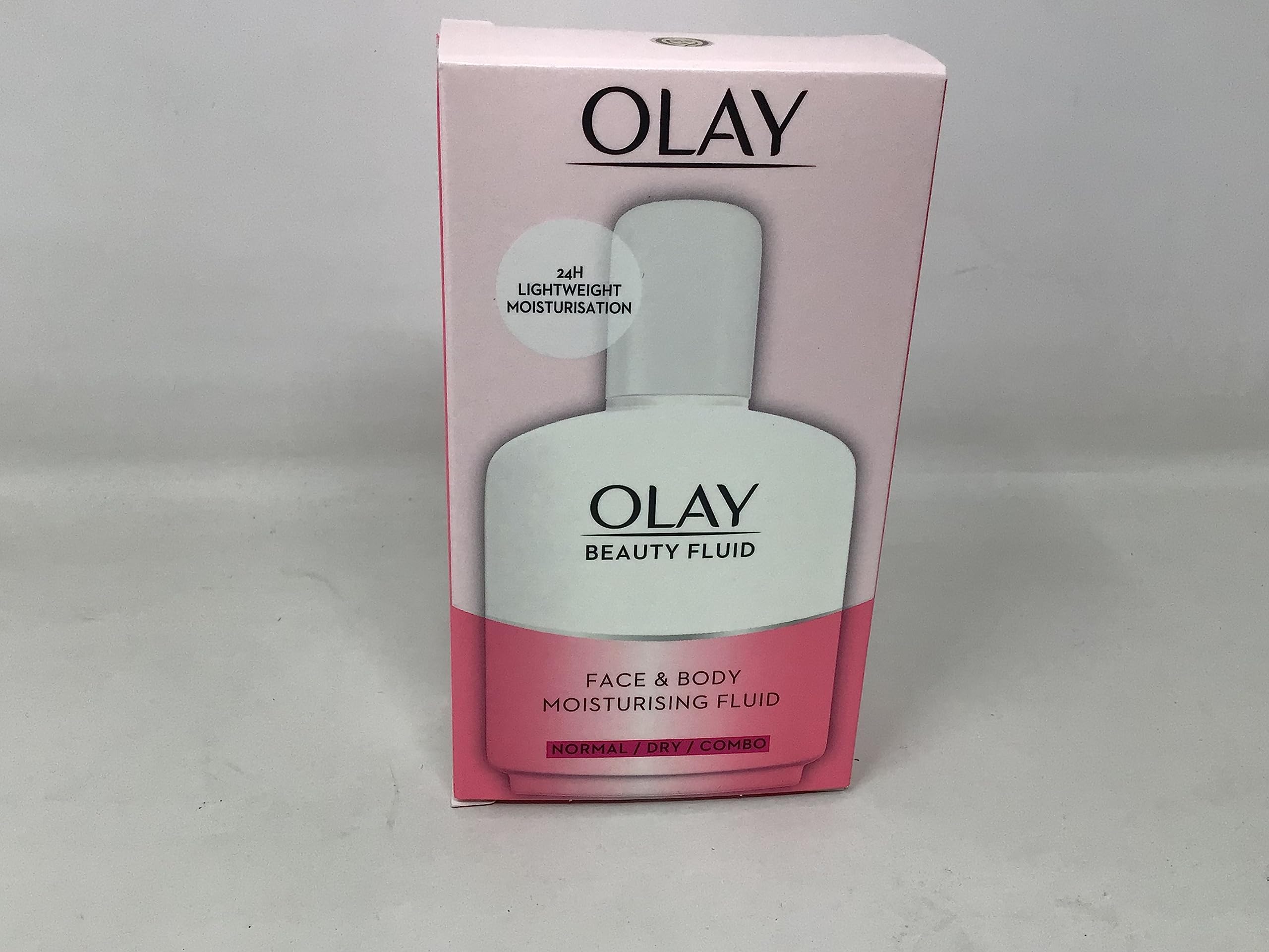 Olay bottle on bathroom shelf suggesting everyday use and accessible hydration