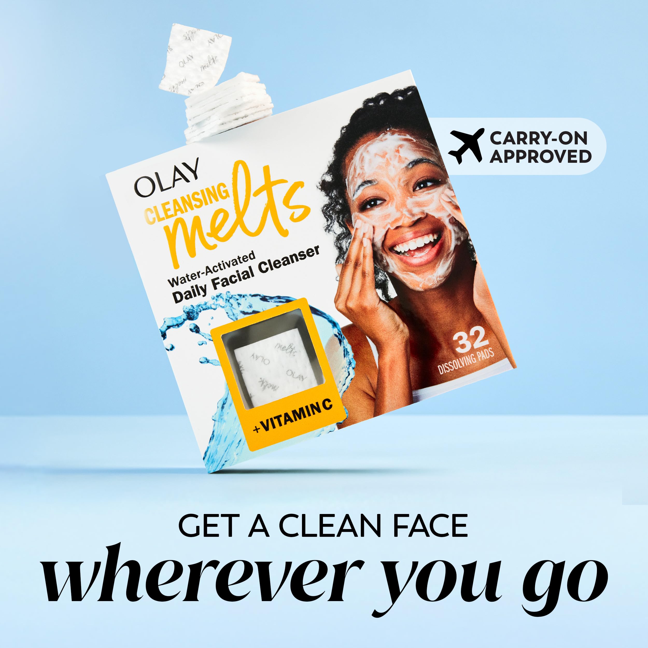 Olay pad next to hand for scale, showing compact travel-friendly size