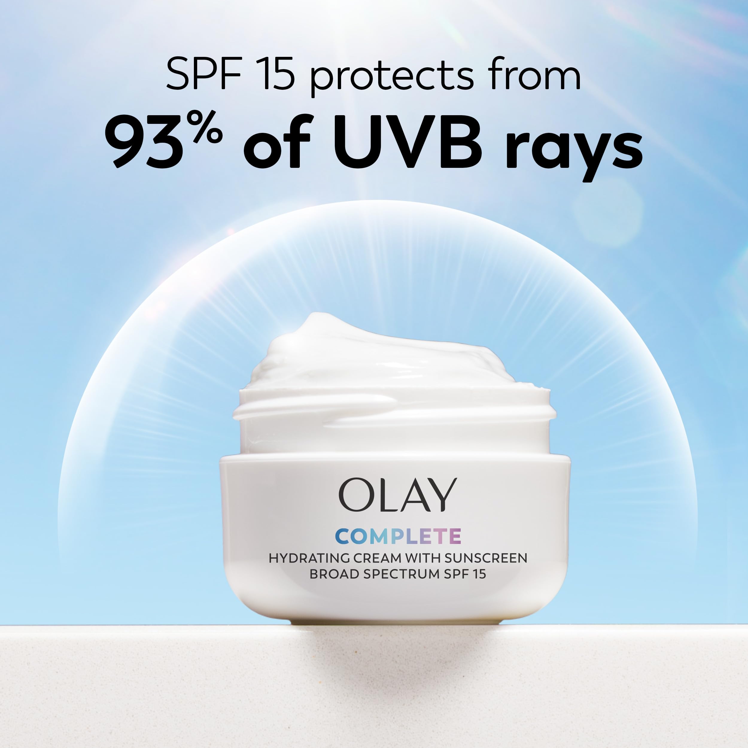 Olay tube next to makeup highlighting smooth layering under cosmetics