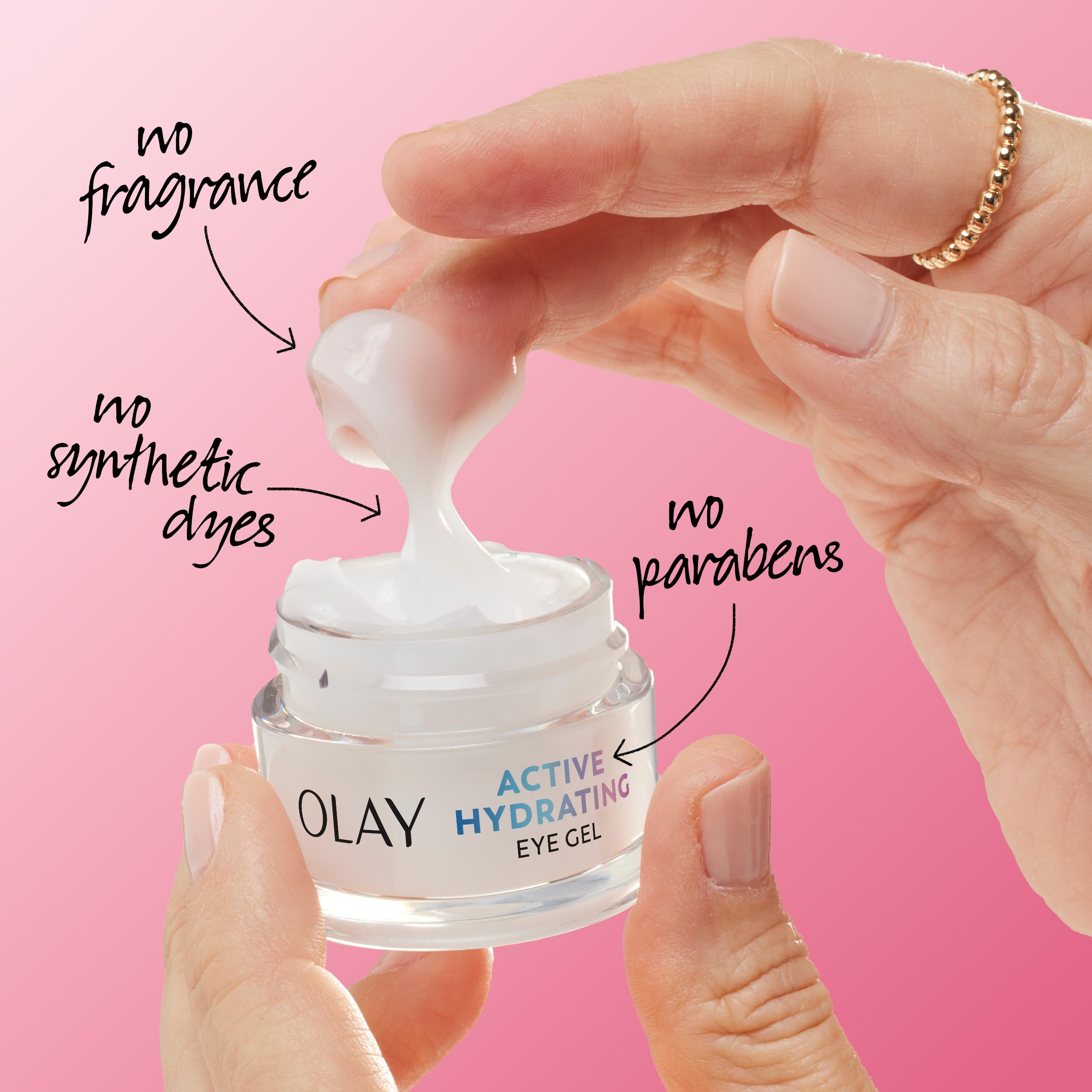 Olay tube held by fingers showing product size for travel convenience