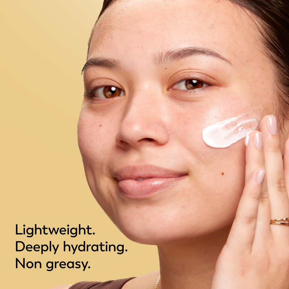 Olay with other skincare items flatlay, shows integration into multi-step regimen